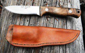 The C.T. Fischer four-inch Bushcraft knife comes with a custom leather sheath.