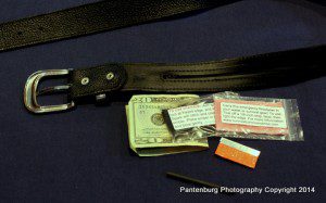 This standard money belt with zipper can carry several survival tools.