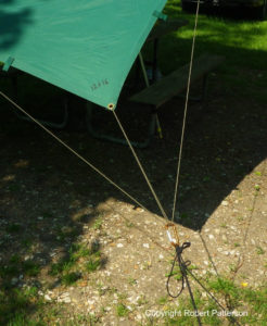 Use this setup to keep individual grommets from ripping out in heavy wind.