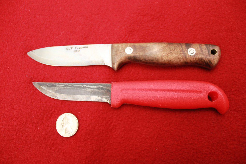 The C.T. Fischer Bushcraft knife is my pet custom knife, but the J. Marrttini utility knife below it is equally useful as a small game knife.