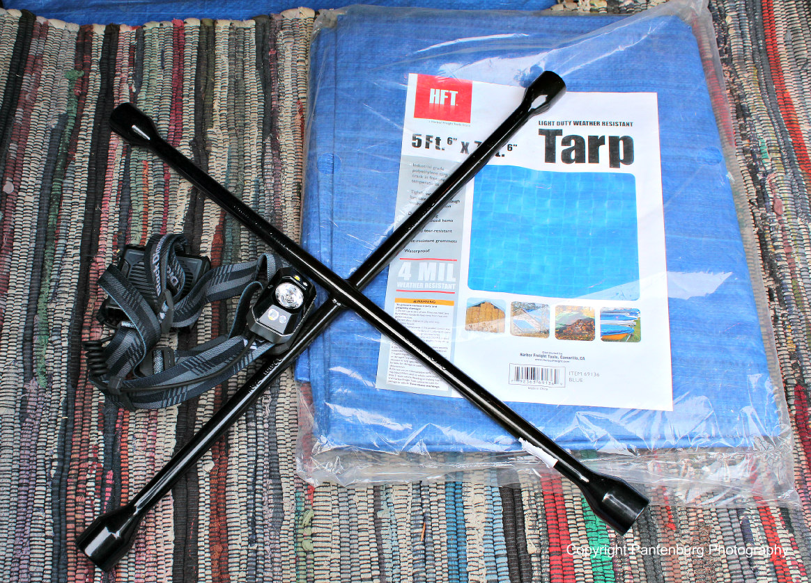 tarp headlamp and tire iron Survival Common Sense Blog Emergency Preparedness