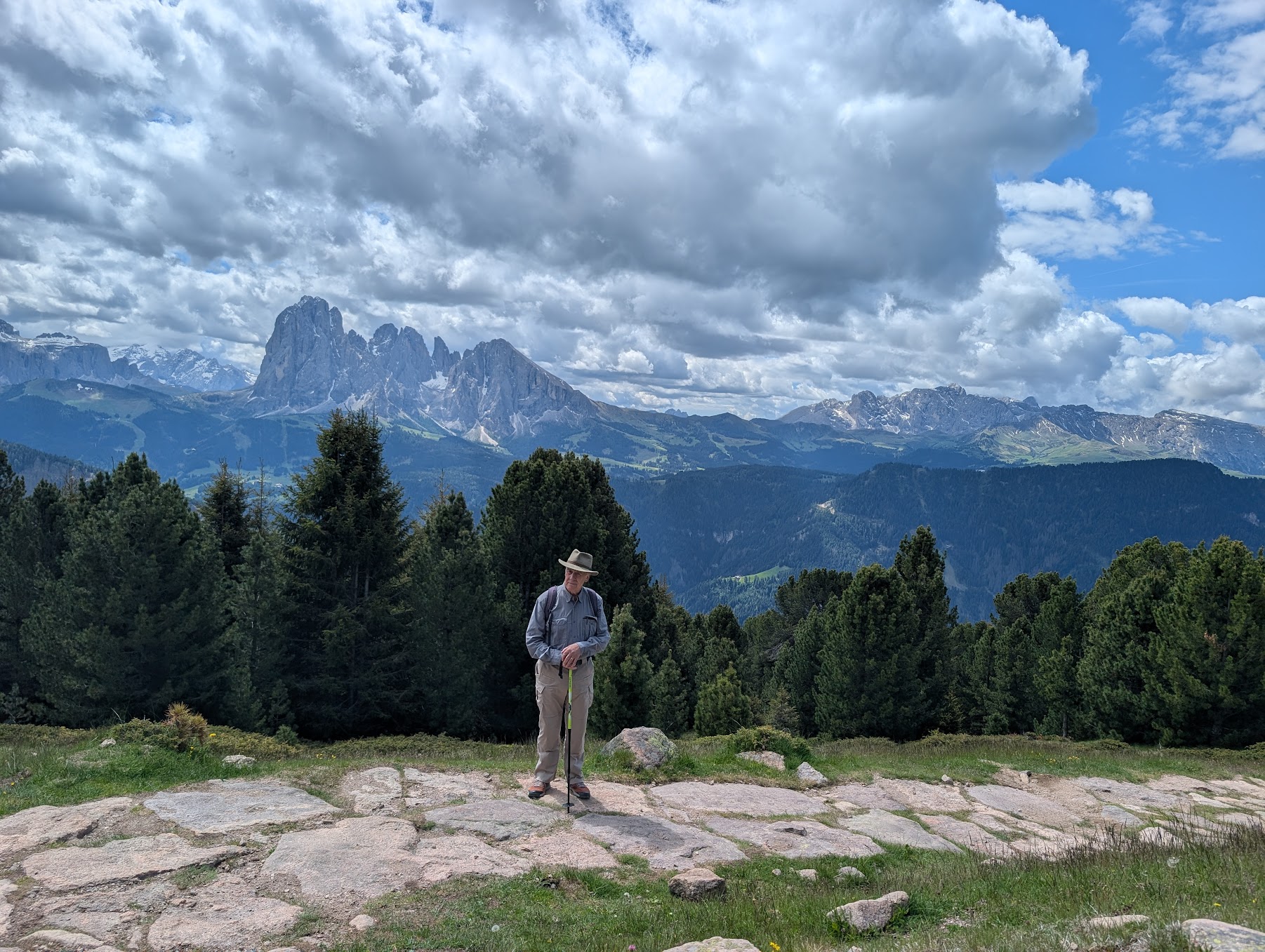 man hiking in Ortisei Italy